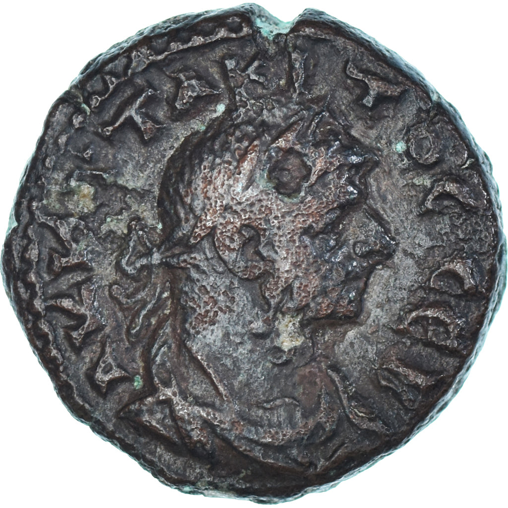 Moneda, Egipto, Tácito